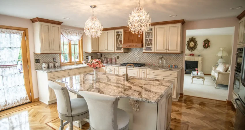 Picture of a high end kitchen renovation with custom cabinets, hardwood flooring, granite counter tops and more