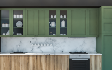 A picture of a modern kitchen with green cabinets