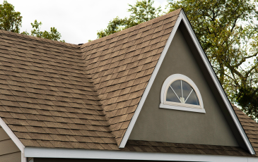 A picture of a roof with asphalt shingles