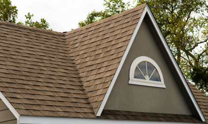 A picture of a roof with asphalt shingles