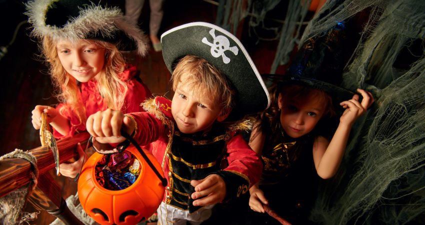 A picture of some children Trick-or-treating